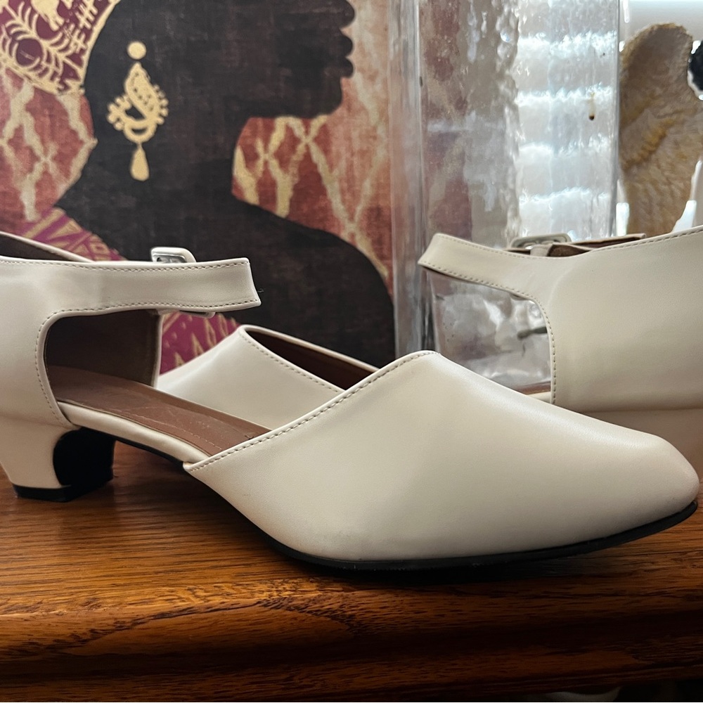 White 1/2 inch heels size 10.5 in women’s